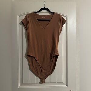 Old navy brown body suit. Never used, new.
